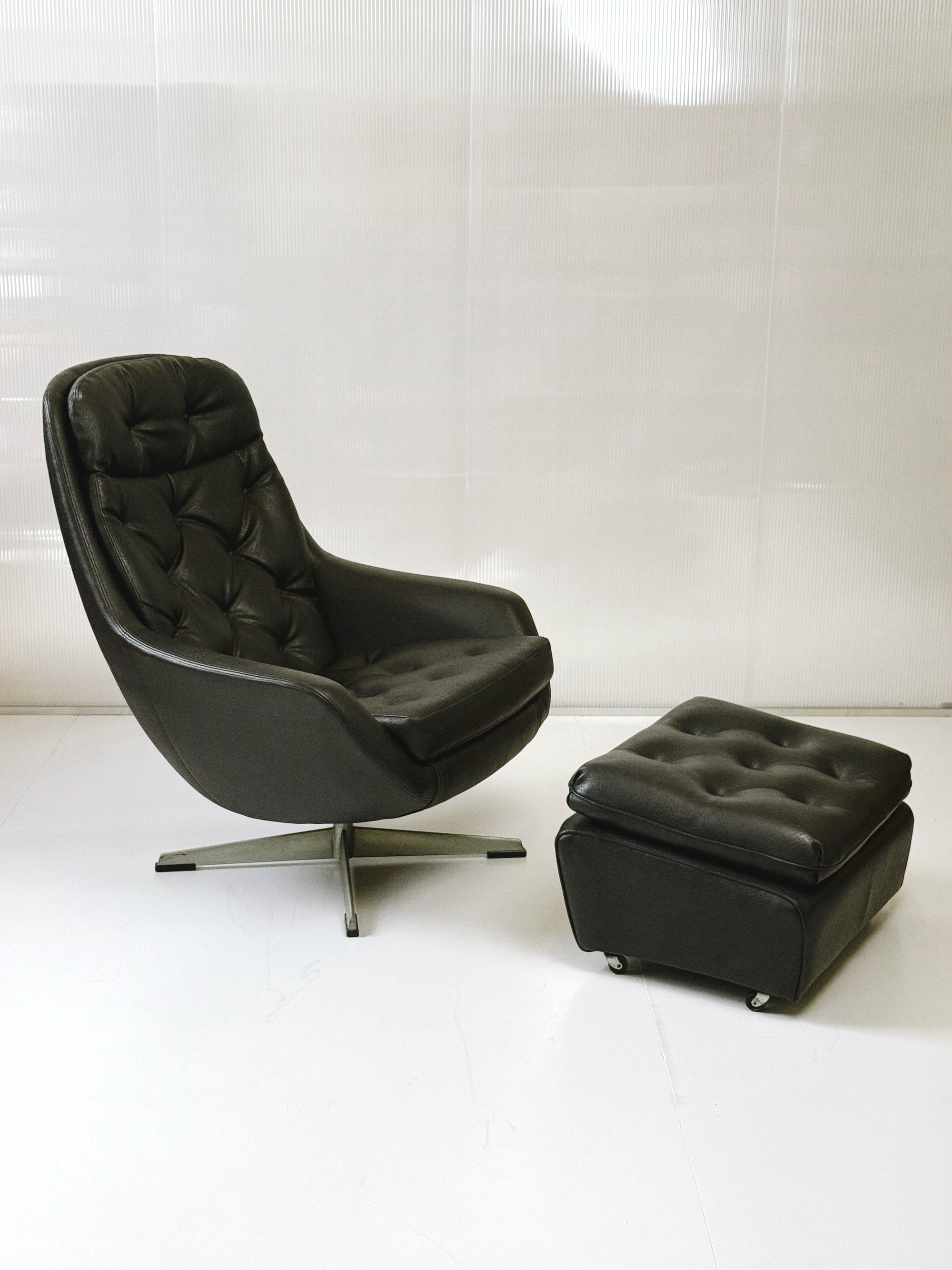 Danish swivel leather armchair & footstool