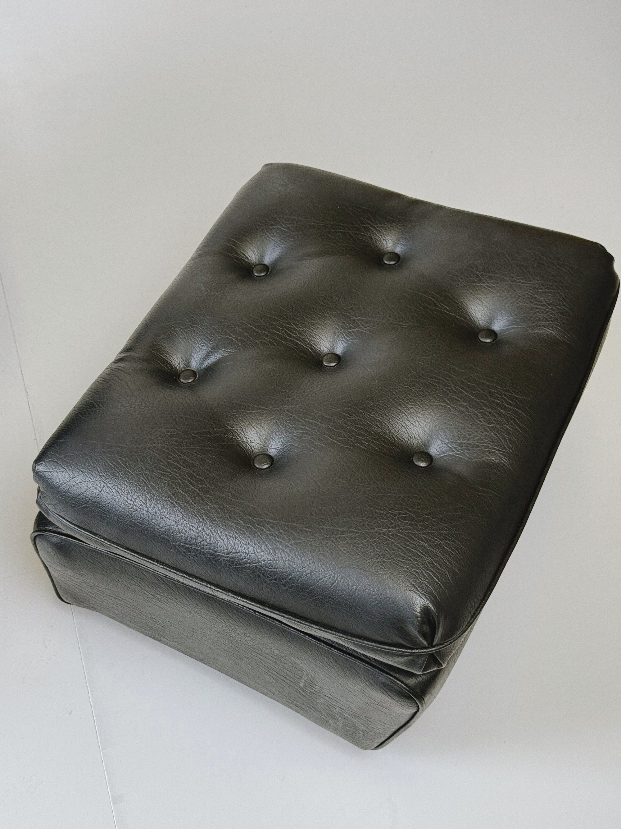 Danish swivel leather armchair & footstool